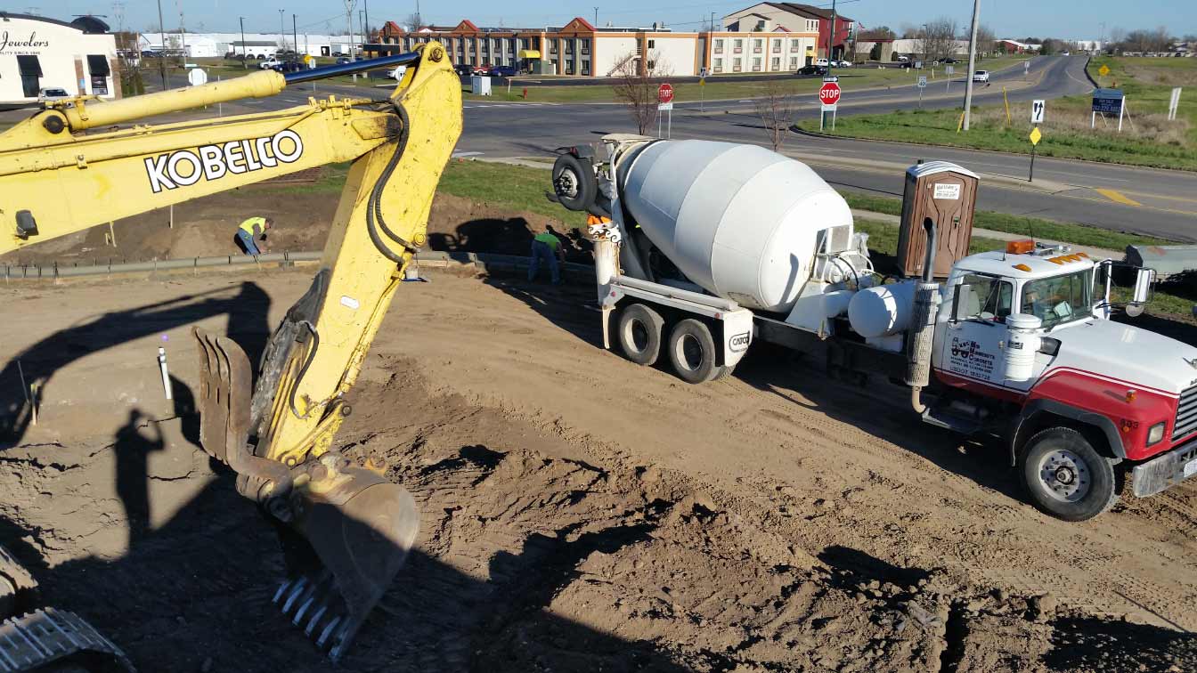 Construction and Land Loans Construction equipment after getting a loan from Sherburne State Bank